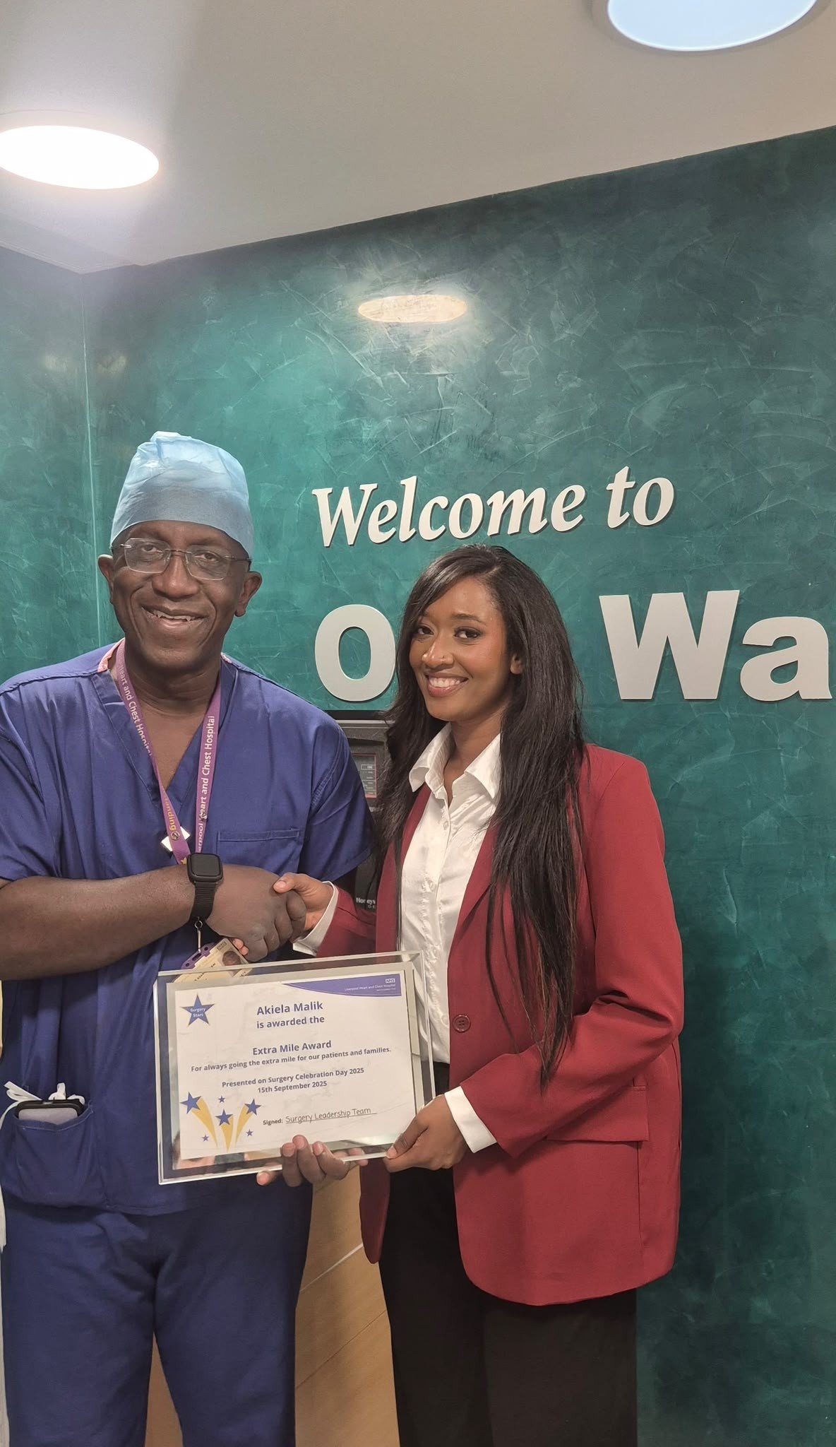 Akiela Malik receiving the Extra Mile Award from Mr Julius Asante Siaw